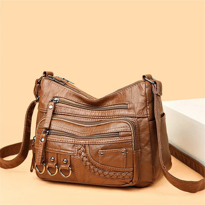 SUZY | STILVOLLE MEHRLAGIGE CROSSBODY-TASCHE