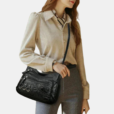 SUZY | STILVOLLE MEHRLAGIGE CROSSBODY-TASCHE