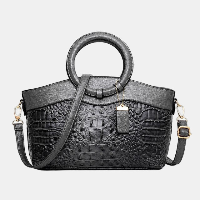 JAYE | STYLISCHE HANDTASCHE IM KROKODILMUSTER